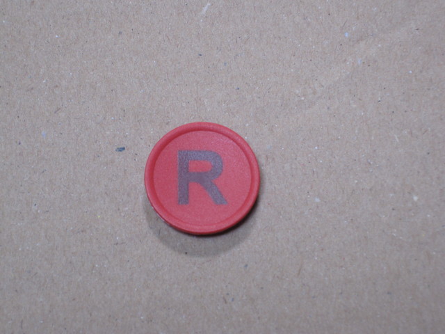 cup (red) with engraving "R" for reset